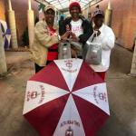 Rainy Day. Sorors Farr-Smith, Soror Gray and Soror Minner.